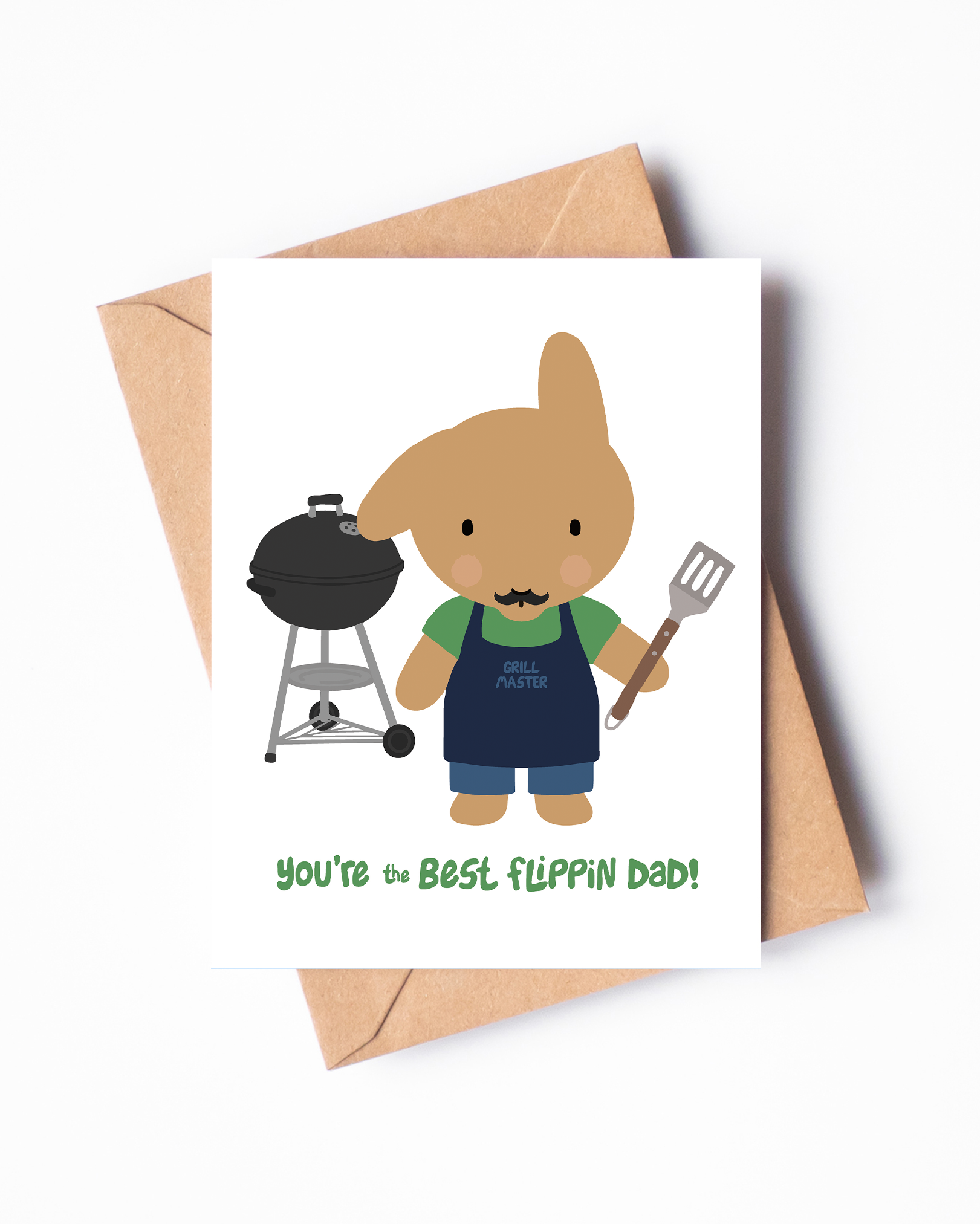 Card with Claude the bun wearing an apron and holding a spatula, next to a black vintage style grill, with text 'You're the best flippin dad!' on a white background.