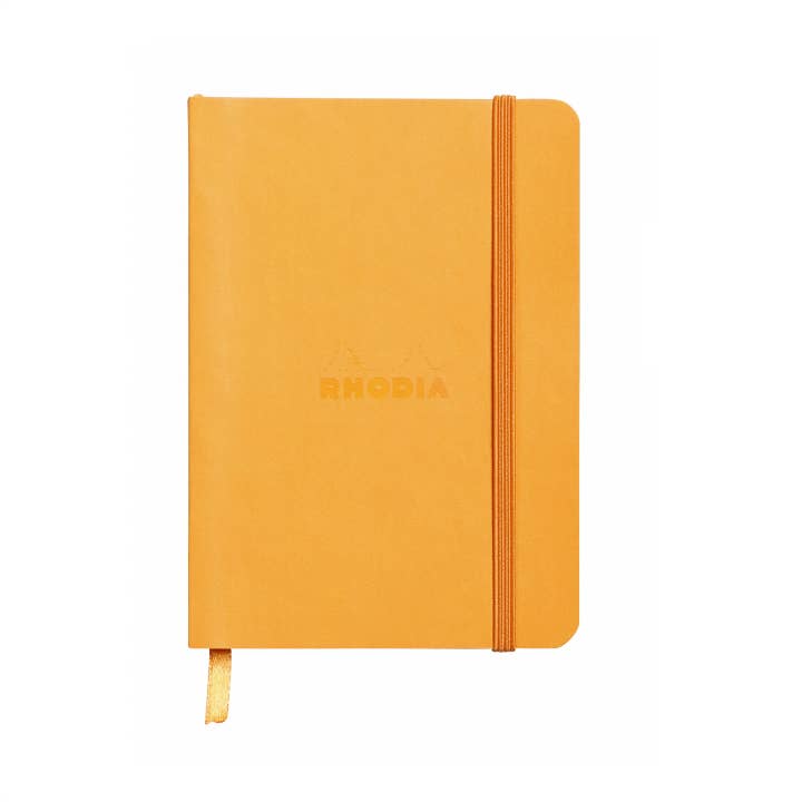 Orange colored rhodia journal with orange strap.